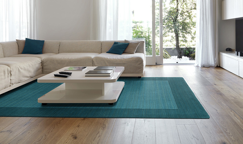 Coles Fine Flooring | Custom Area Rug couch