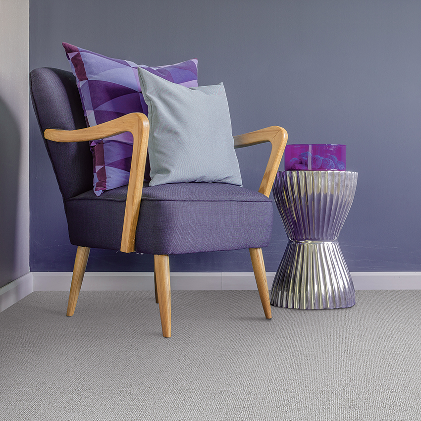 Coles Fine Flooring | periwinkle chair and walls